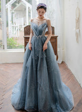 Blue Tulle Beaded Long Unique Straps Prom Dress
