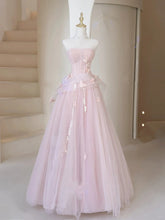 Vestido de tul con escote en forma de A, sin tirantes, color rosa y con encaje