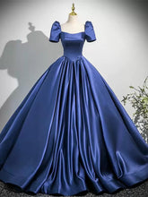 Vestido de fiesta de satén azul oscuro con mangas cortas y espalda con cordones