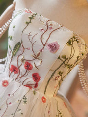 Vestido de fiesta corto de tul color marfil hasta la rodilla con escote redondo