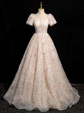 Precioso vestido de fiesta de escote corazón color champán con mangas cortas