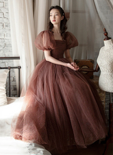 Precioso vestido de fiesta de tul con mangas abullonadas y graduación