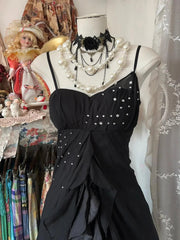 Vestido largo de fiesta de gasa negra con tirantes y cuentas