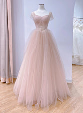 Vestido de fiesta largo rosa de tul con cuentas y hombros descubiertos