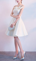 Astera Chic One-Shoulder Bow Mini Dress
