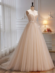 Vestido de fiesta con tirantes de tul color marfil y flores