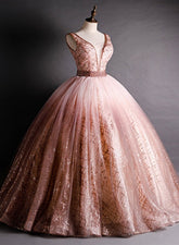 Hermoso vestido formal de fiesta con cuentas y escote en V en color rosa
