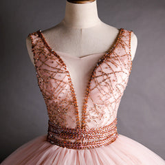 Hermoso vestido formal de fiesta con cuentas y escote en V en color rosa