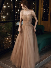 Vestidos de fiesta largos con tirantes de tul y cuentas color champán
