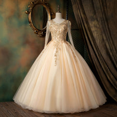 Hermoso vestido formal de manga larga en color rosa perla con apliques de encaje