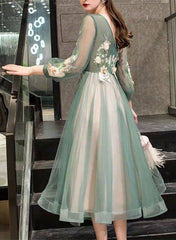 Vestido de fiesta verde floral de manga larga y largo hasta la rodilla