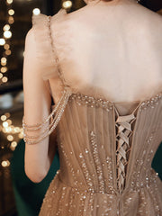 Vestidos de fiesta largos con tirantes de tul y cuentas color champán