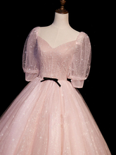 Vestido largo formal de tul rosa con mangas cortas