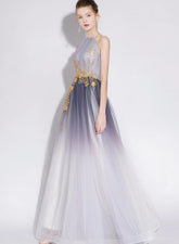 Hermoso vestido de fiesta largo de tul degradado con cuello halter y corte A
