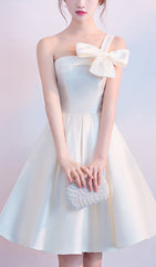 Astera Chic One-Shoulder Bow Mini Dress