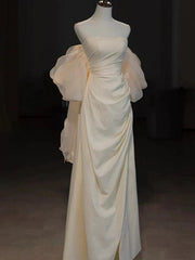 Vestido formal largo de tafetán color marfil con escote en A y corte en A 