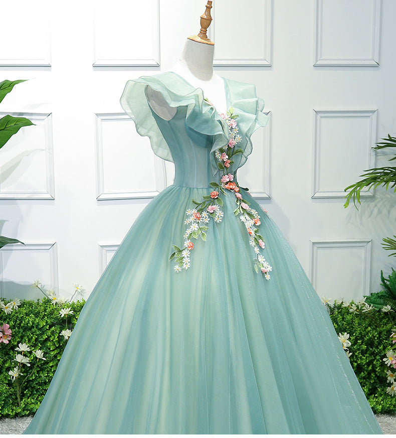 Hermoso vestido largo de tul verde con apliques de encaje para dulces 16 