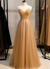 Hermoso vestido de fiesta de tul con cuentas y escote en forma de corazón 