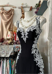 Vestido formal de sirena negro con tirantes de licra y encaje 