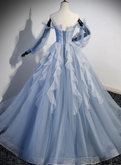 Vestido de fiesta azul claro con mangas largas y cuentas 
