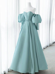 Vestido largo formal azul con escote en forma de A y mangas abullonadas 