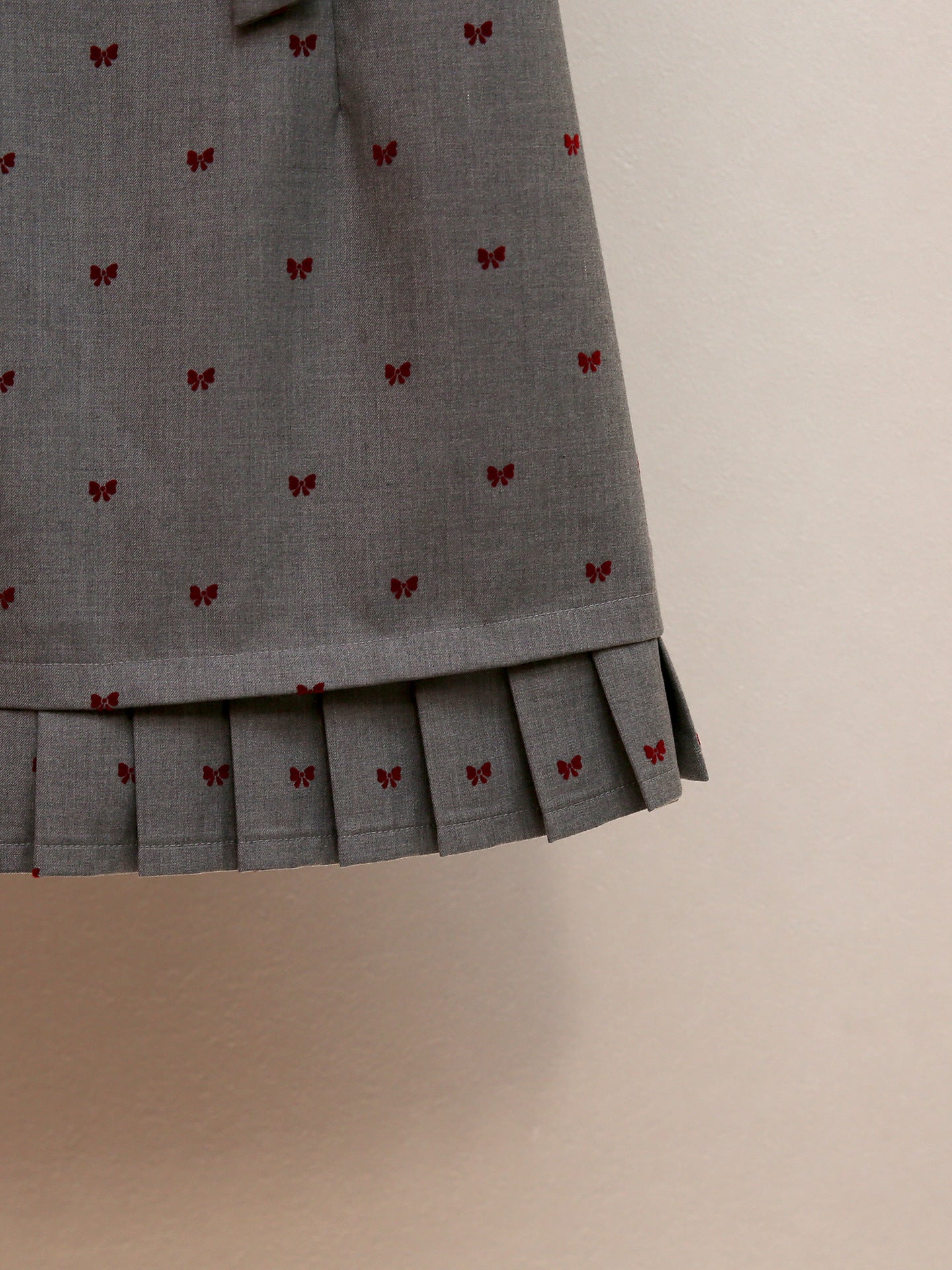 Haruye Playful Bow Print Sleeveless Mini Dress