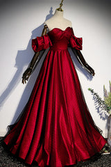 Precioso vestido de fiesta negro y rojo con escote en forma de corazón y hombros descubiertos 