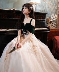 Vestido de noche con top de terciopelo verde y apliques de encaje de tul color marfil 