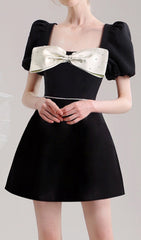 Elegant Black Statement Bow Mini Dress with Puff Sleeves