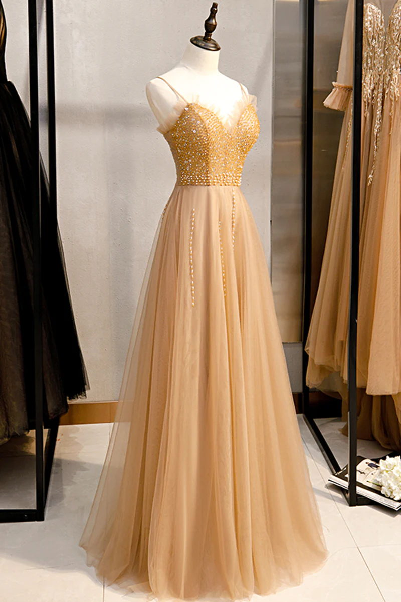 Hermoso vestido de fiesta de tul con cuentas y escote en forma de corazón 