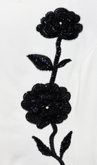 Gagenia Elegant Long Sleeve White Gown with Black Floral Embellishment