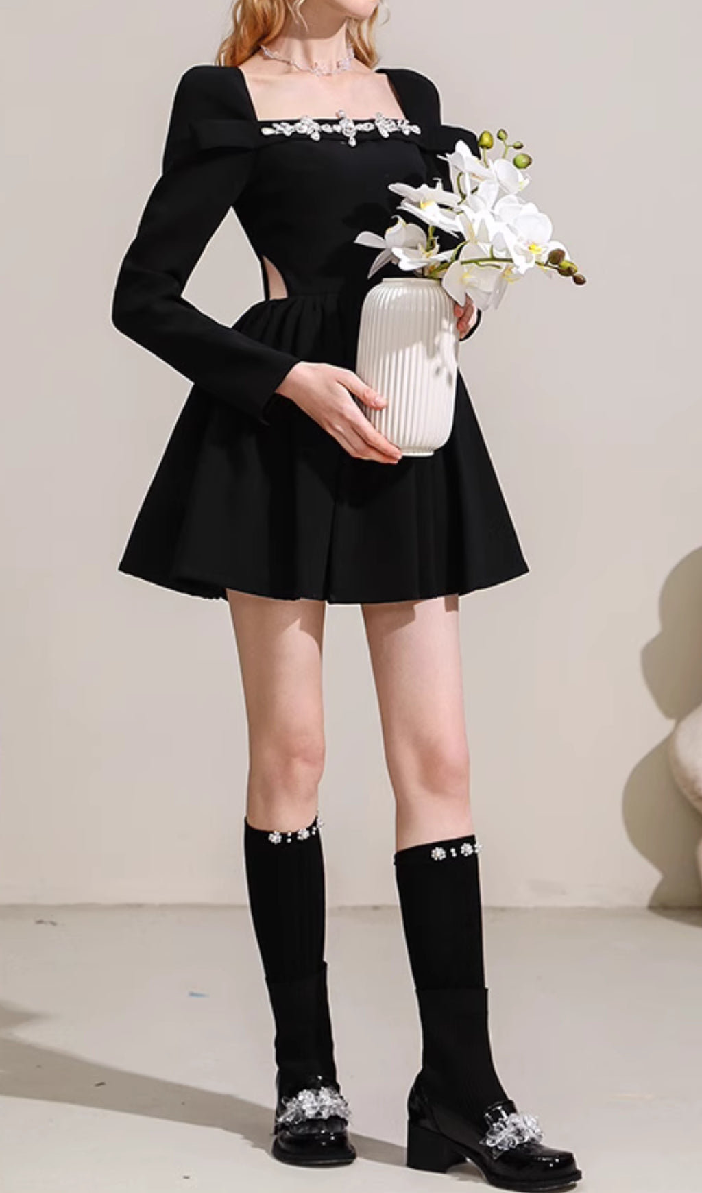 Cathal Dazzling Crystal Black Mini Dress with Long Sleeves & Chic Cut-Outs