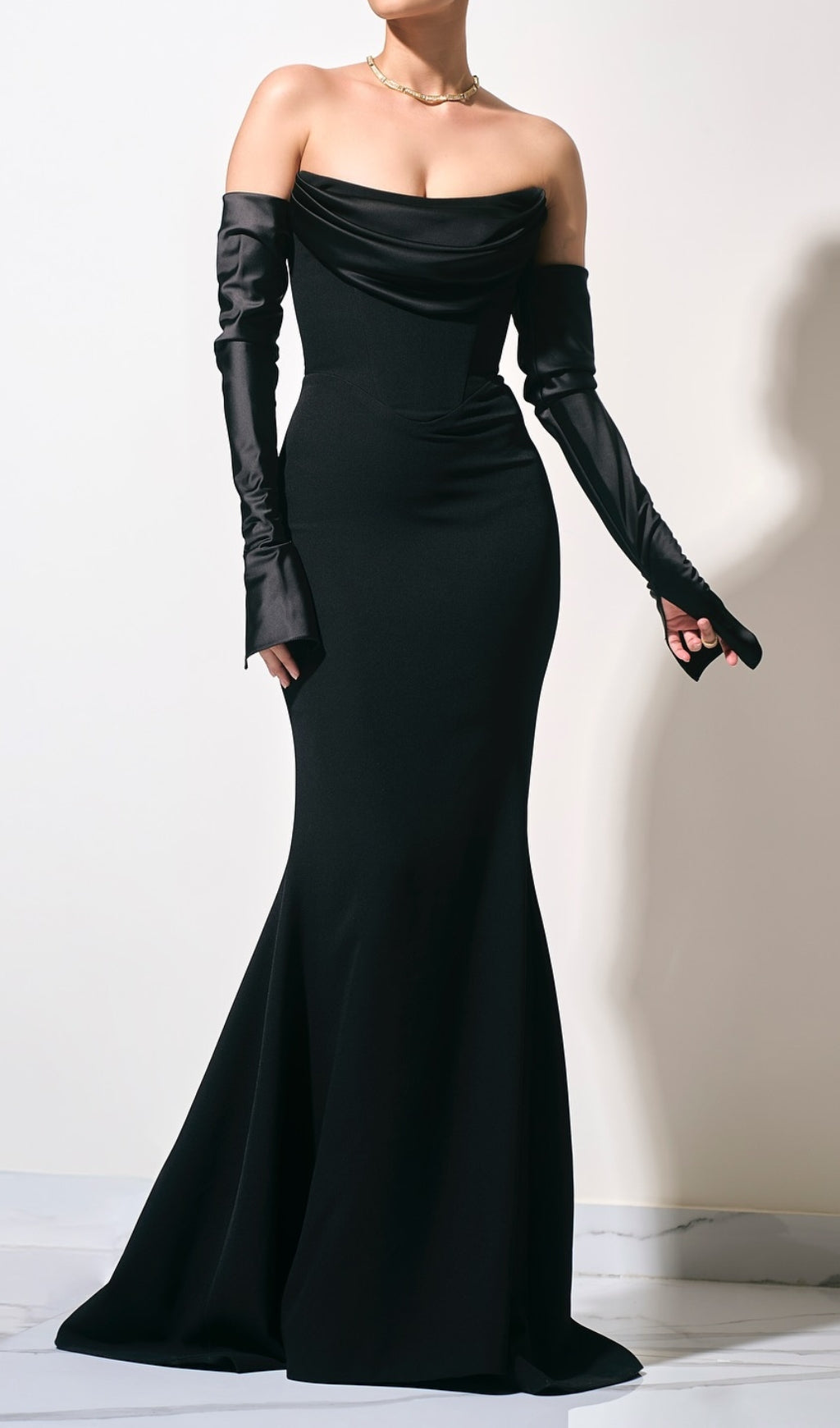 Deliz Black Strapless Draped Maxi Gown with Chic Arm Sleeves