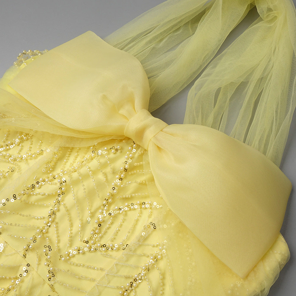 Jermaine Yellow Halter Bow Beaded Maxi Gown