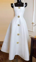 Gordie Elegant Black A-Line Midi Dress with Gold Button Embellishments