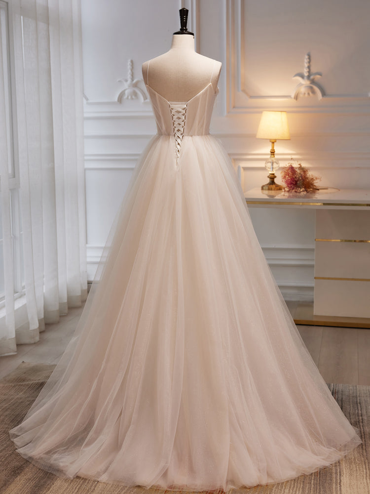 Vestido de fiesta con tirantes de tul color marfil y flores 