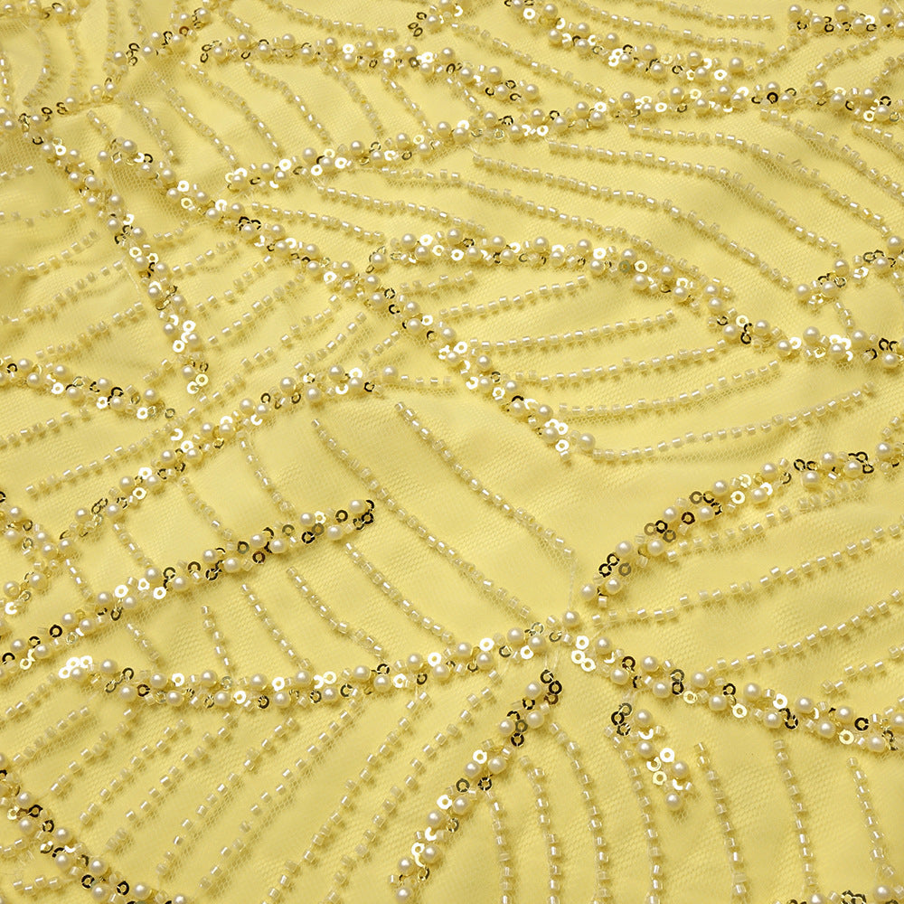 Jermaine Yellow Halter Bow Beaded Maxi Gown