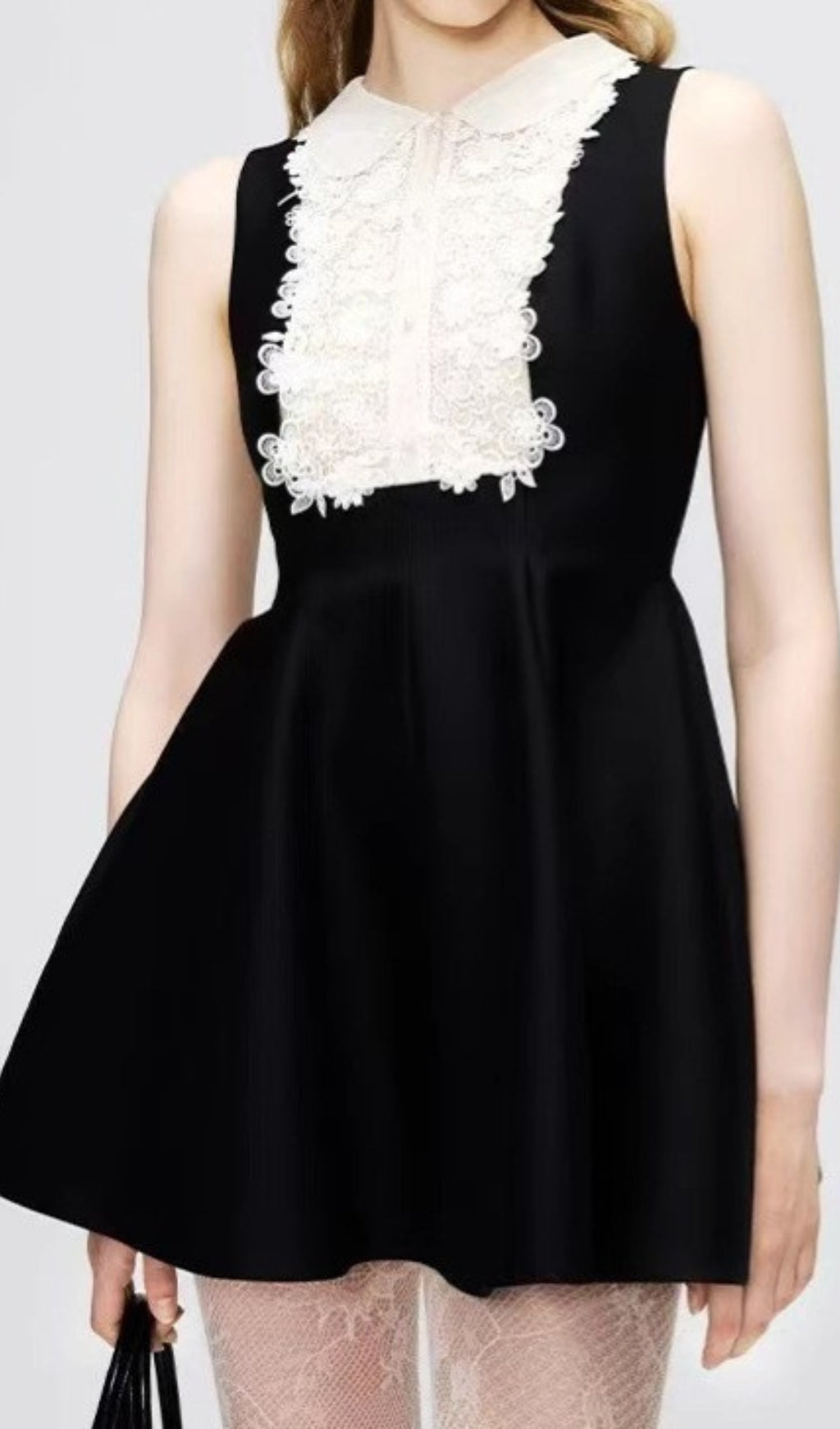 Elegant Black Sleeveless Mini Dress with Ornate Lace Collar