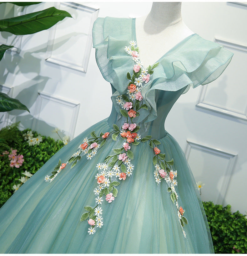 Hermoso vestido largo de tul verde con apliques de encaje para dulces 16 