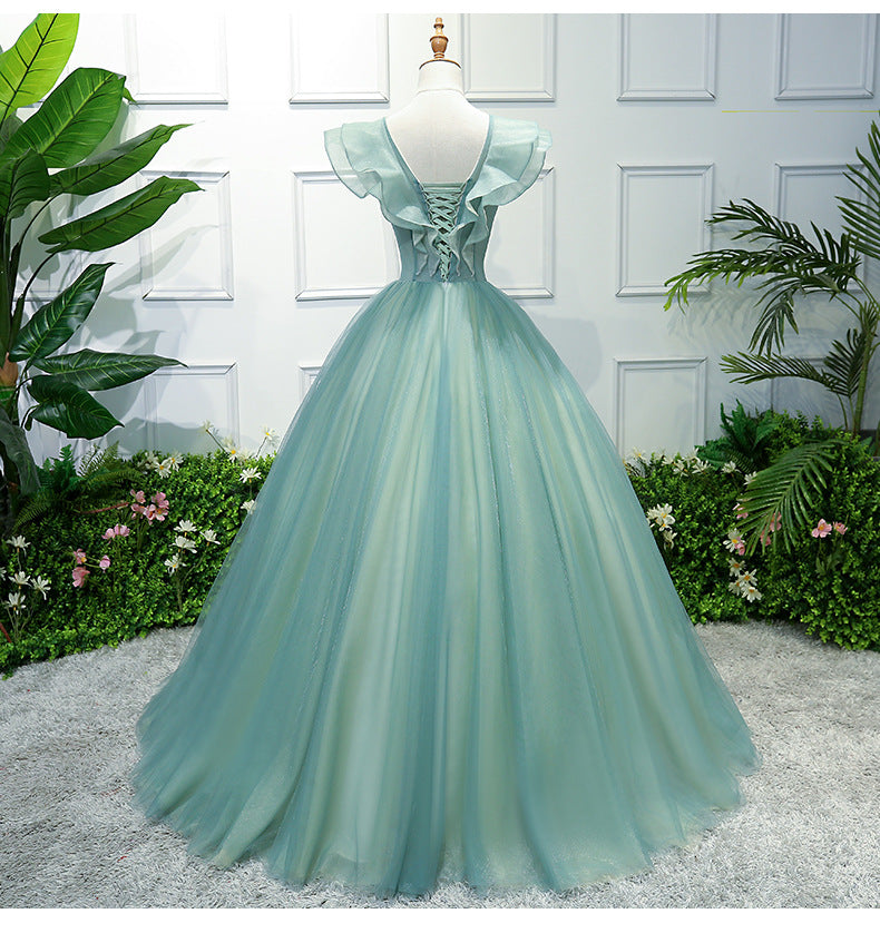 Hermoso vestido largo de tul verde con apliques de encaje para dulces 16 