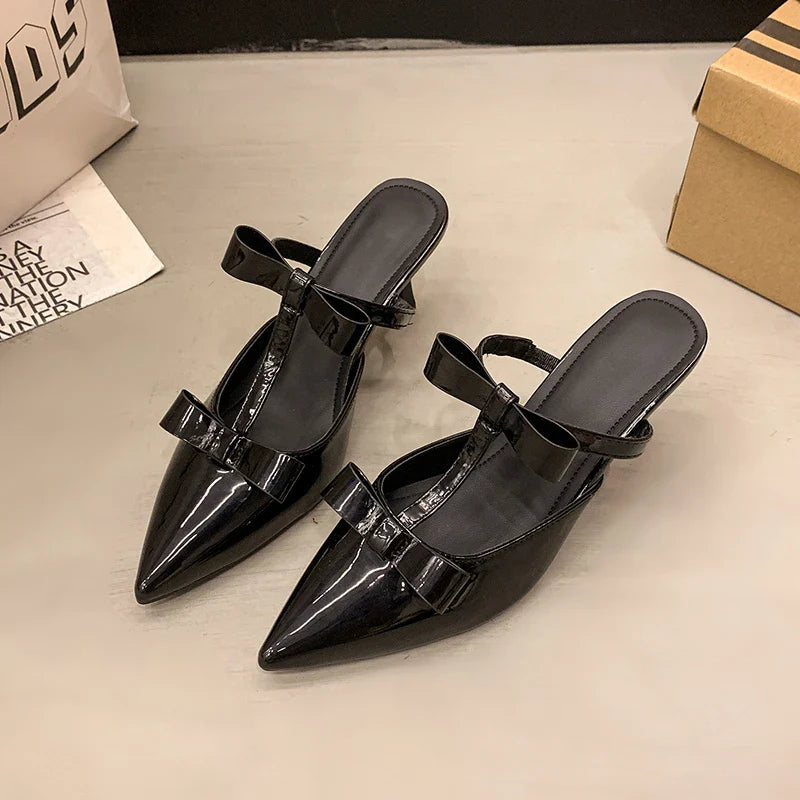 Beautiful peach-colored high-heeled thin slippers