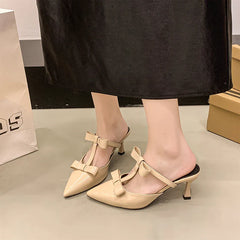Beautiful peach-colored high-heeled thin slippers
