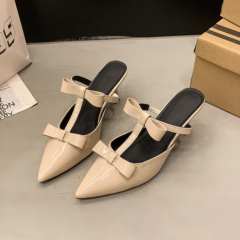 Beautiful peach-colored high-heeled thin slippers