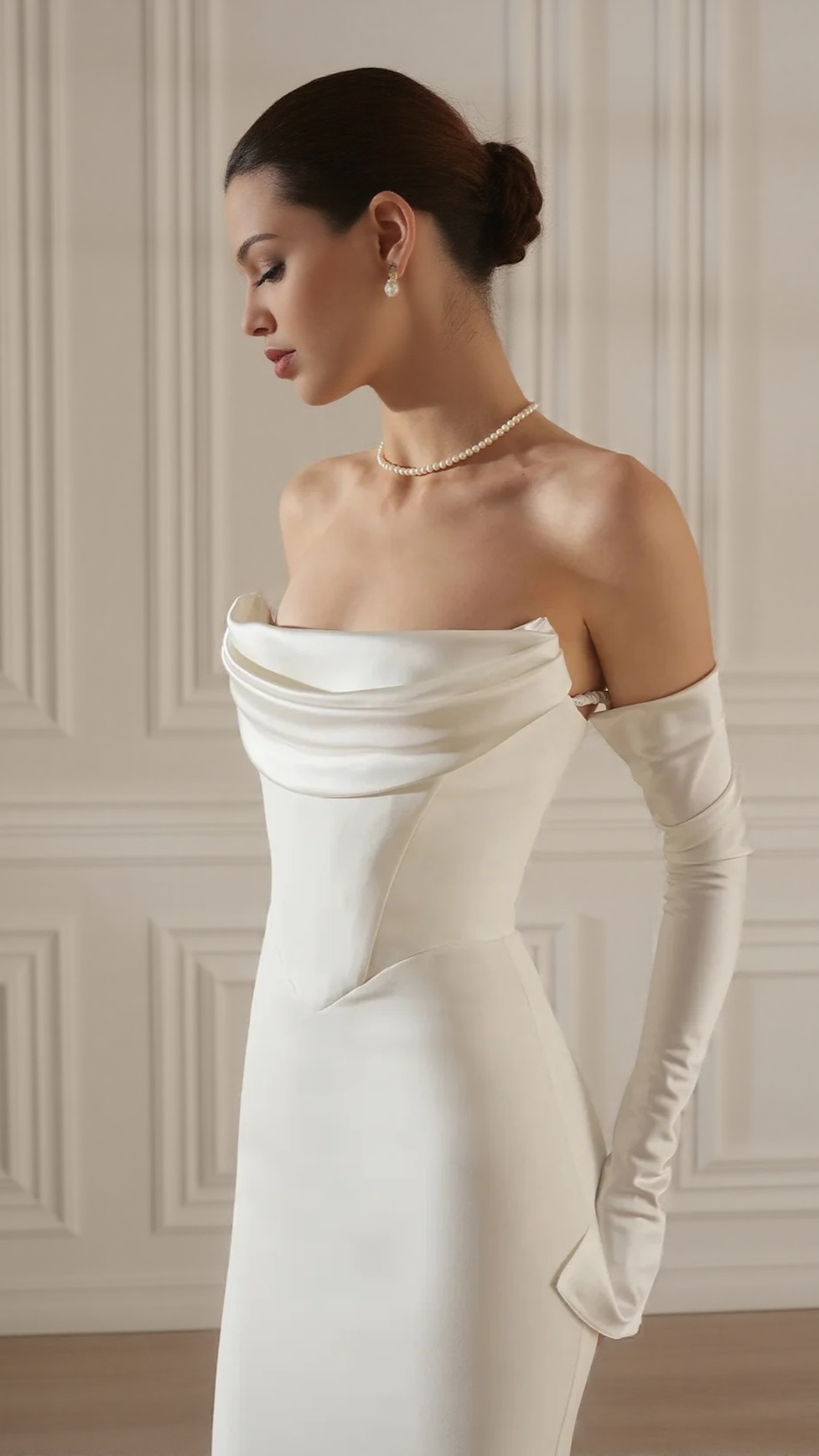 Elegant White Strapless Maxi Dress with Draped Long Sleeves
