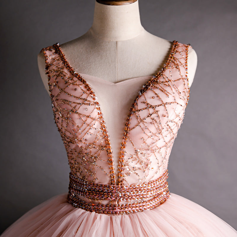 Hermoso vestido formal de fiesta con cuentas y escote en V en color rosa 