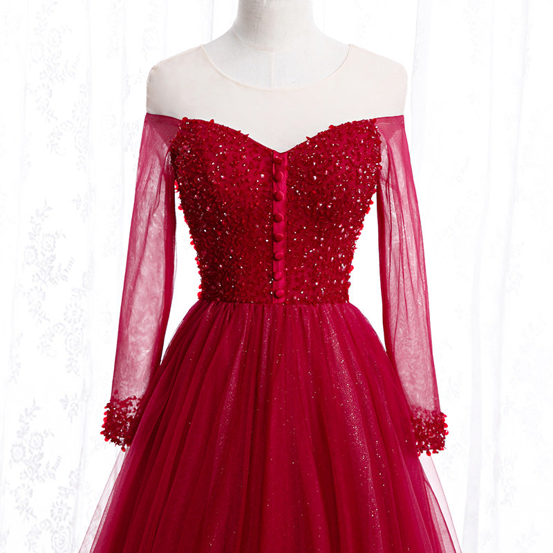 Vestido de noche de tul con cuentas y mangas largas en color rojo vino 