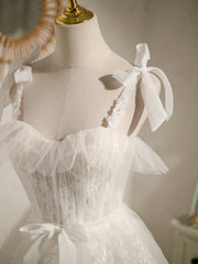 Elegante vestido de fiesta de tul color marfil con encaje 