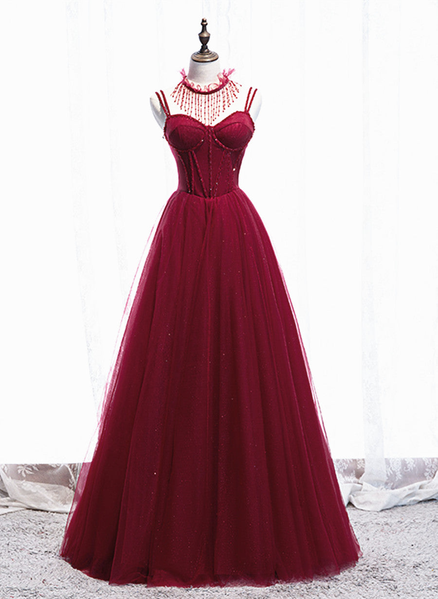 Vestido de fiesta con tirantes de cuentas de color rojo vino. 