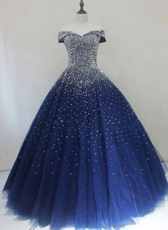 Vestido de fiesta con hombros descubiertos y brillo azul 