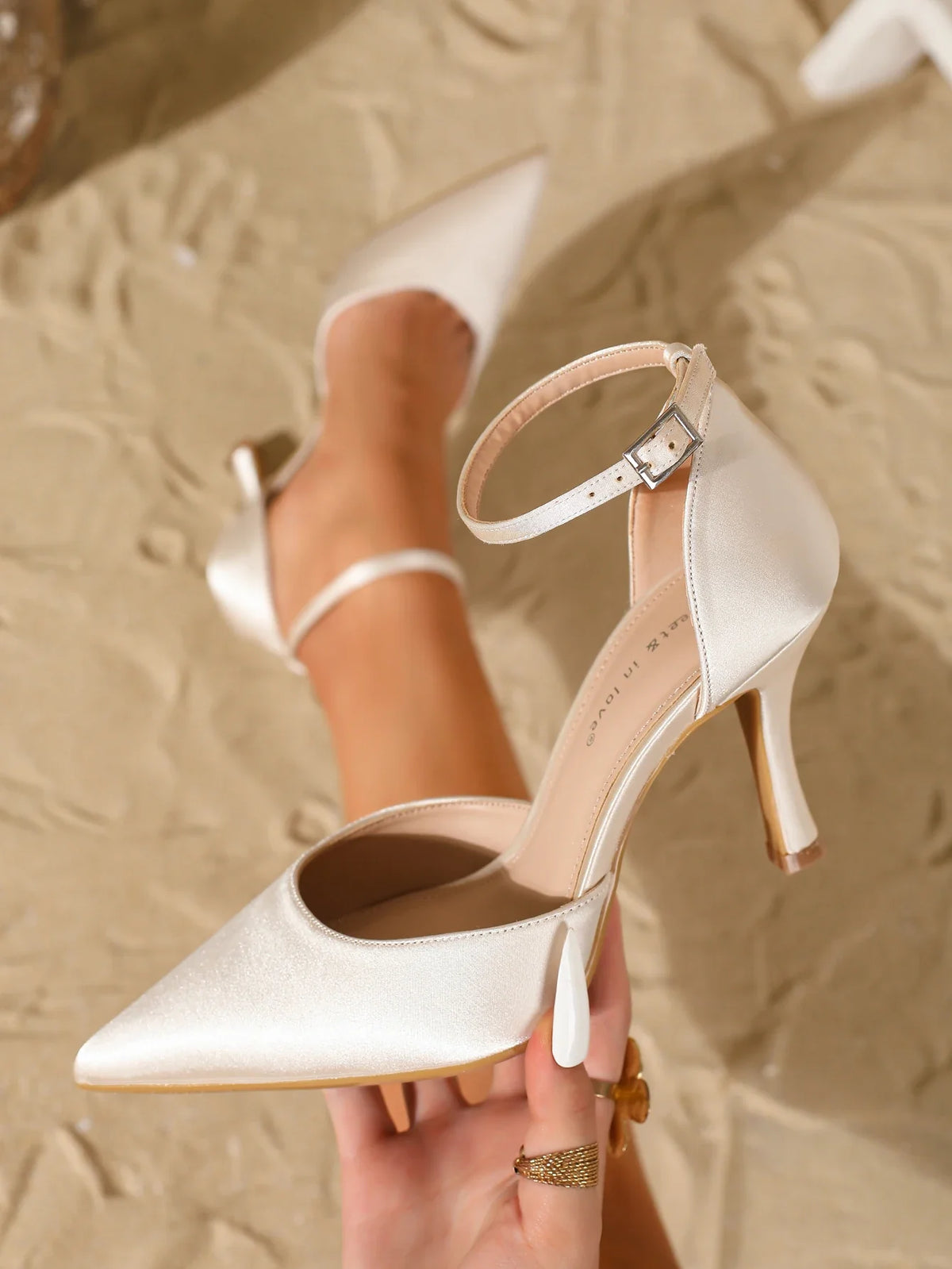 fashionable elegant satin pointed-toe high heels with a back ankle strap